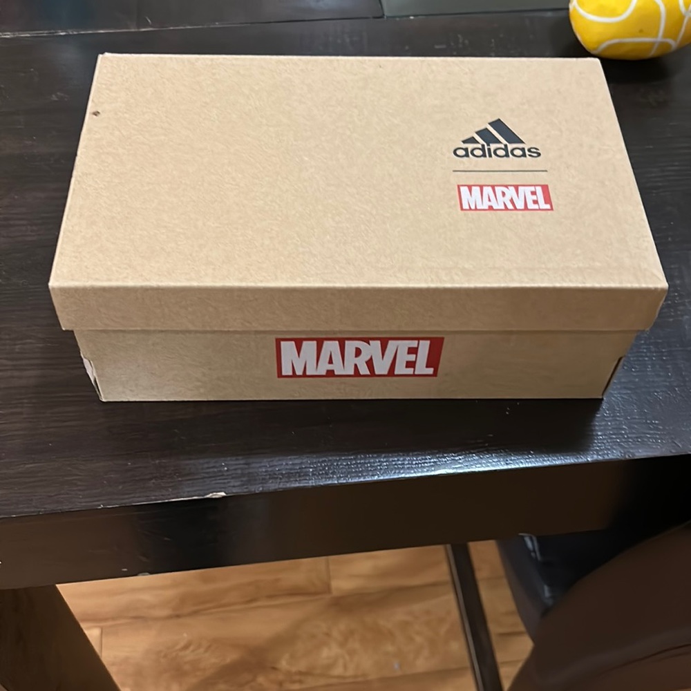 White and blue marvel shoes with box
